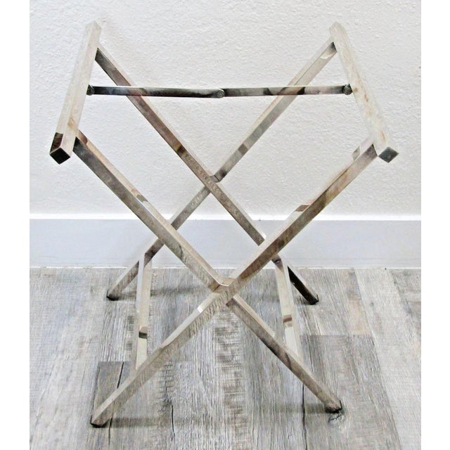 This elegant 1970s Chrome Campaign Folding Table Base is a fully assembled antique piece with a sleek silver color and a...