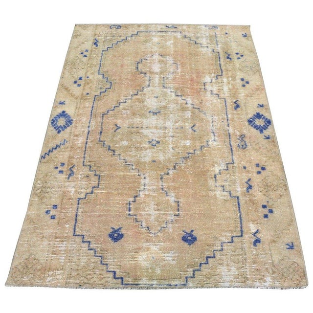 Hand-knotted with care using traditional rug-making techniques, this wool rug blends timeless craftsmanship with a modern...