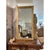 An elegant 19th century French Louis XVI mirror featuring a finely carved giltwood frame with classic neoclassical...
