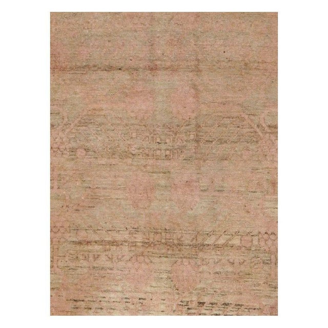 A vintage East Turkestan Khotan gallery carpet handmade during the mid-20th century. Measures: 6' 8" x 12' 6".