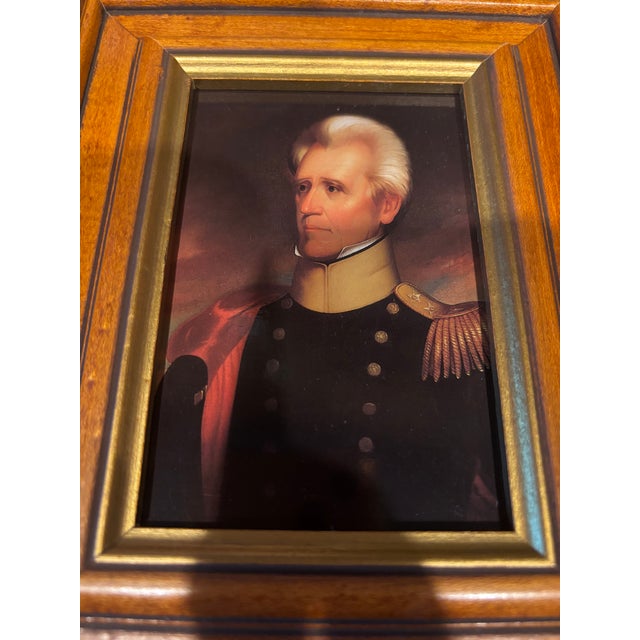 A charming pair of vintage framed American presidential portrait plaques featuring Abraham Lincoln and Andrew Jackson,...