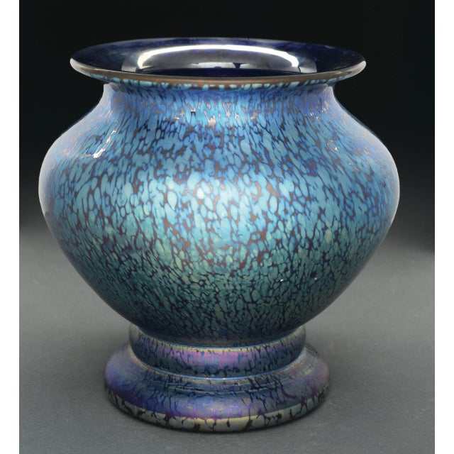 This Loetz vase in the Cobalt Papillon pattern has blue iridescent Papillon design covering the exterior of the vase. Vase...