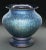 This Loetz vase in the Cobalt Papillon pattern has blue iridescent Papillon design covering the exterior of the vase. Vase...