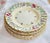 Seven (7) Fine Bone China Dessert Plates by Minton. Printemps pattern with Pink, Blue, and Purple Flowers. Scalloped trim....