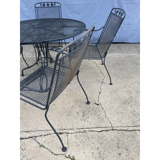 UNMARKED by Meadowcraft in a Dogwood Pattern 4 Chairs and a 48" Pedestal table that top can be removed. All 4 chairs can...