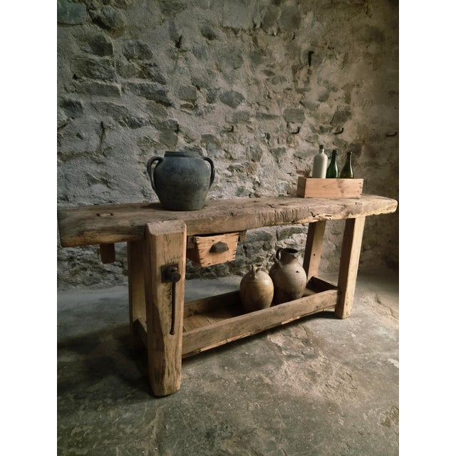 This antique French workbench dates from the 19th century and has been converted into a practical console table while...