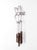 This vintage folk art wind chime features a hand-formed wire bird suspended above weathered metal chimes with a...