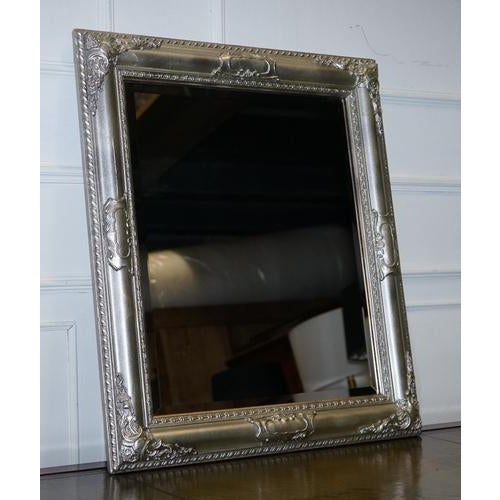 Beautiful Carved Silver Bevelled Mirror. Measurements Height - 77.5 cm Width - 67 cm Depth - 4 cm Please note all...