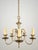 Colonial style brass chandelier with five swooping arms and patina finish. This light requires five standard Edison style...