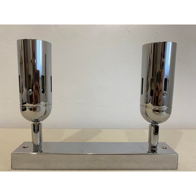 Vintage adjustable double wall light manufactured by sijaj hrastnik in slovenia, dating from the 1990s. The lamp retains...