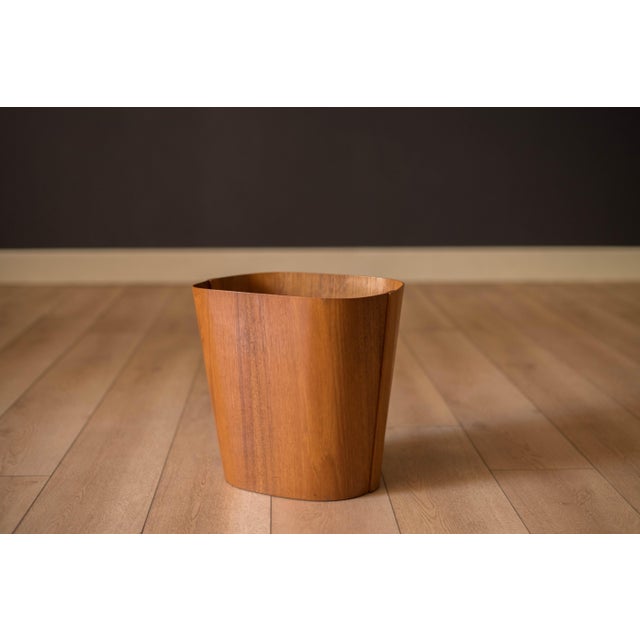 Vintage waste paper bin in teak by Beni Mobler, Denmark circa 1960s. This functional decor piece features a unique wide...