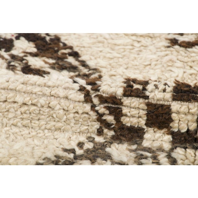 Hand-knotted in wool and originating circa 1950-1959, this 6x15 vintage shag runner joins Rug & Kilim’s Moroccan...