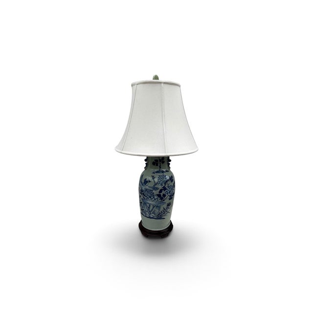 Striking pair of large-scale vintage Chinese porcelain table lamps featuring elegant pale celadon grounds richly decorated...