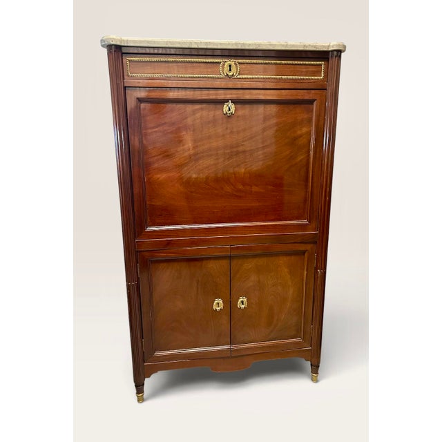Louis XVI Mahogany Secrétaire à Abattant, Stamped J. Canabas, JME, 18th Century An elegant Louis XVI secrétaire à abattant...