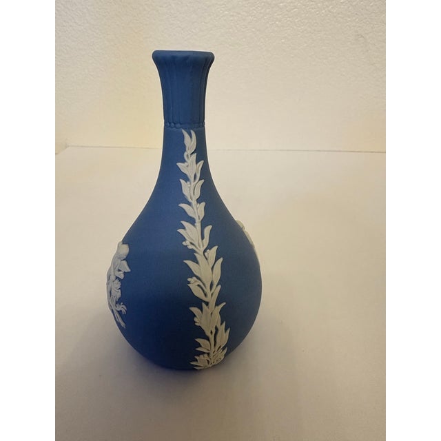 This set of Wedgwood with the compote and vase was made in the 1970's but the design of them began in the late 1700's by...