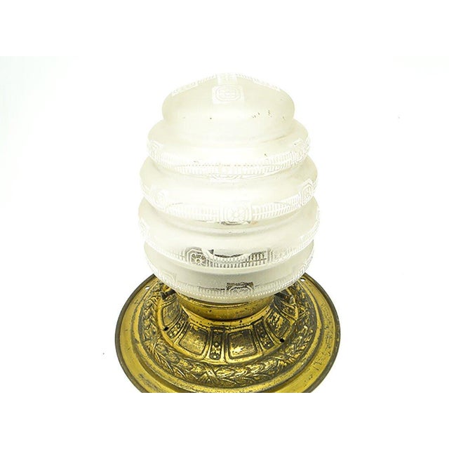 The plafond was produced at the beginning of the twentieth century. The construction is brass, glass lampshade. It is...