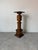Beautiful vintage American carved wood pedestal featuring richly detailed turned elements, stepped molding, and elegant...