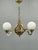 Exceptional neo-baroque chandelier produced in czechoslovakia during the 1930s. Crafted from solid brass and featuring...