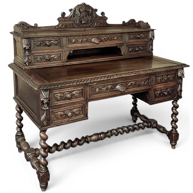 19th Century French Renaissance Revival Desk with Extending Writing Surface is a bold and beautifully carved example of...