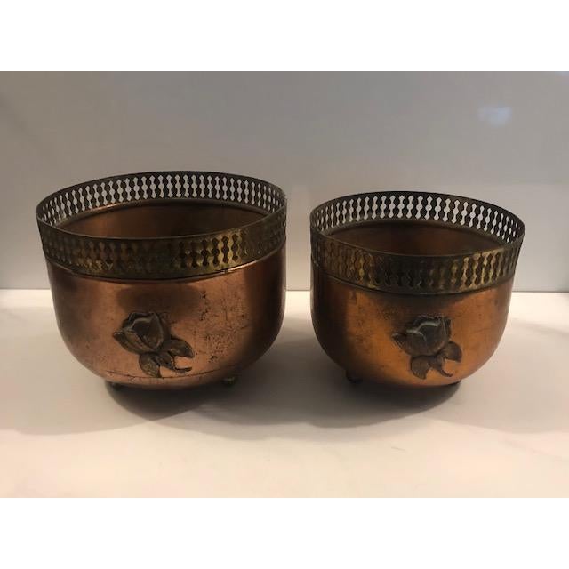 This fabulous pair of Vintage Copper Brass Reticulated Footed Planters with Rose will be a standout on any kitchen counter...