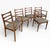 This vintage dining chair set features a charming collection of ladder-back chairs with floral tapestry upholstery,...