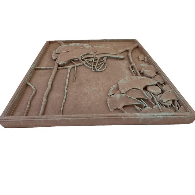 This striking 2003 bronze wall relief, titled Ginkgo, was designed and cast by artist Llewellyn and produced by Ginkgo...