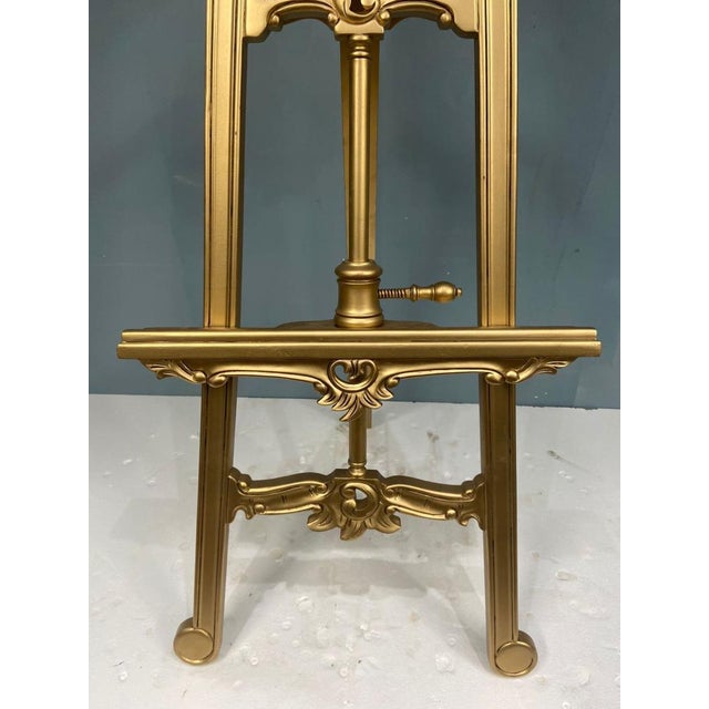A profusely carved gilded easel with adjustable height control circa We date this to circa 1930 Great for displaying...