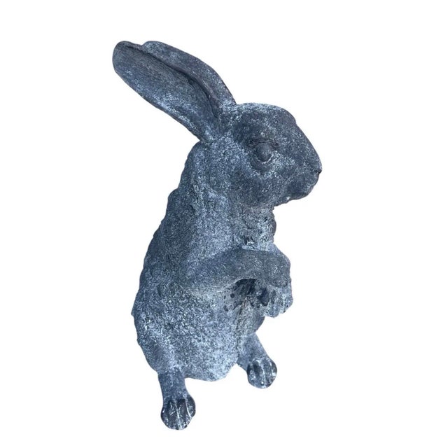 Add a touch of whimsical sophistication to your landscape or home with this beautifully weathered rabbit statuette....