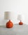 A rare pair of french mid century red ceramic table lamps by jacques & dani ruelland produced in their own atelier in...