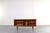 Danish teak sideboard created in the Scandinavian Modern / Mid-Century Modern style. This piece perfectly reflects why...