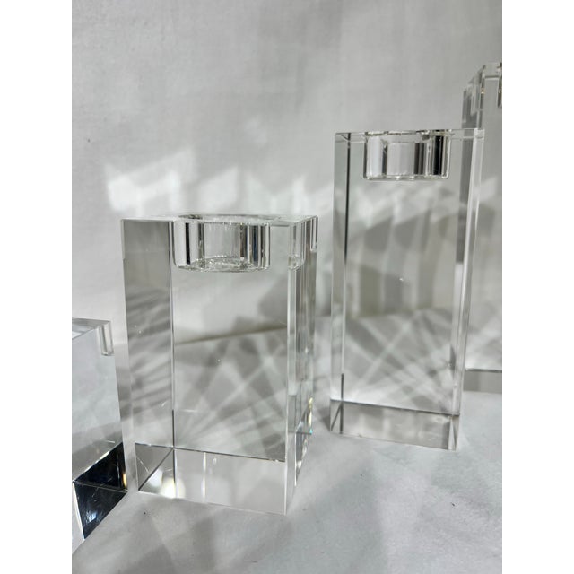 Set of 4 crystal tea light candle holder from the Bombay Company ranging from 3” to 7.5” in height. All in good shape and...