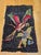 This exceptional vintage American hand-hooked rug, crafted in the early 1900s in New England, is a captivating expression...
