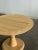 W42 H30.5 KC28 Our pedestal base table, the Forma features a sculptural architectural form through a hand turned central...