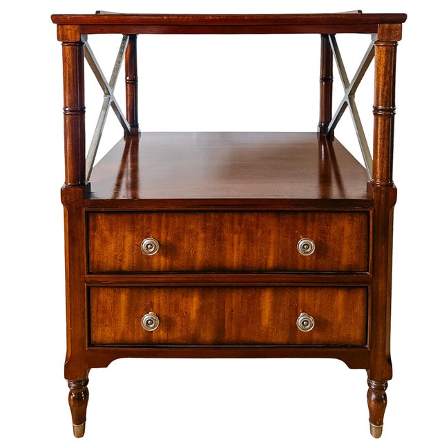 Pair of Ethan Allen Eugene Night Tables made of rich, warm-toned mahogany from their Newport Collection, now retired. Each...