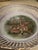 Beautiful German bowl with a deer family scene on the surface. The reticulated edges add to its uniqueness along with its...
