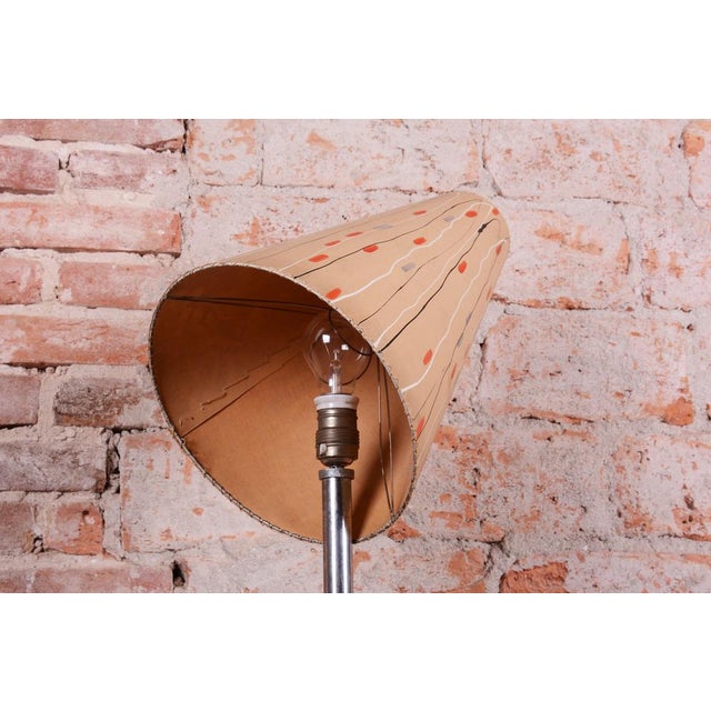This intriguing floor lamp represents a fascinating design period of the 1940s, when the strict geometry of Bauhaus began...