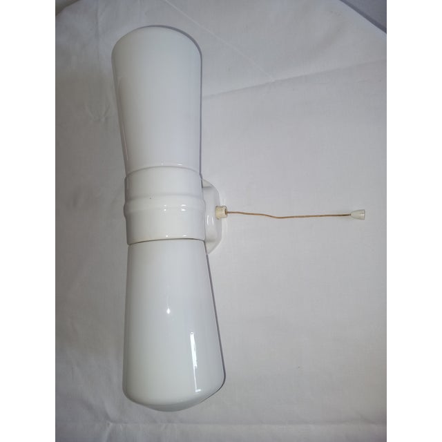 The wall lamp is equipped with 2x E14 bulbs, shipped without bulbs, in mint condition. Up to 250V (Europe/UK Standard).The...