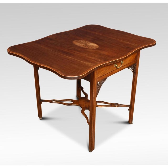 George III Pembroke table, the well-figured mahogany top with central oval inlay, incorporating two hinged flaps, above a...