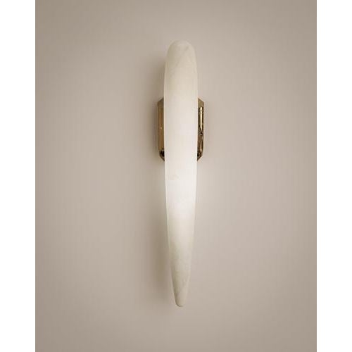 Hero wall lamp onyx marble by studio romell dimensions: w 10 x d 9 x h 56 cm materials: white onyx, cast bronze carlos and...