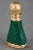 Piriform malachite flask set in a gold frame finely chiseled with floral motifs and interlace on amati gold background....