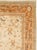 This Mid-20th century Turkish Anatolian large carpet presents an elegant floral composition across a warm ivory field. A...