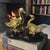 Mid Century brass duck figurines mounted on wood base. Great bookcase and tabletop decor. Measures 6” w x 3” d x 4.5”h.