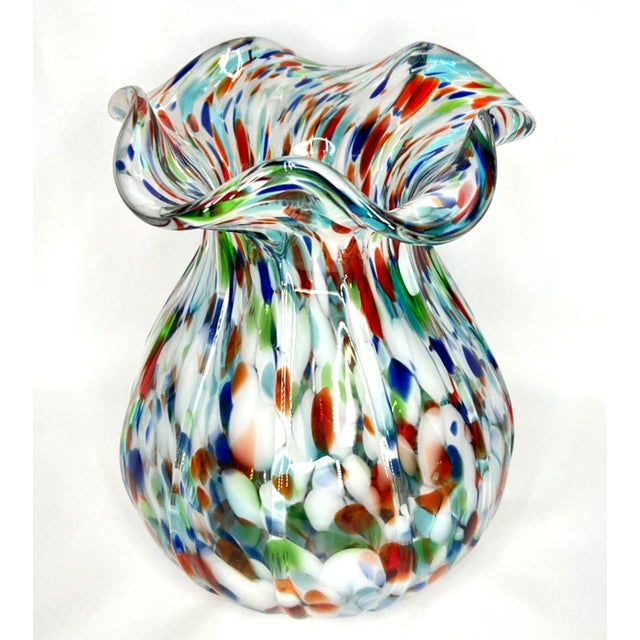 Hand-blown glass body alive with classic millefiori ("thousand flowers") murrine in vibrant multicolors – reds, blues,...
