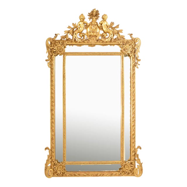 Antique Wall Mirror with Volutes and Putti For Sale