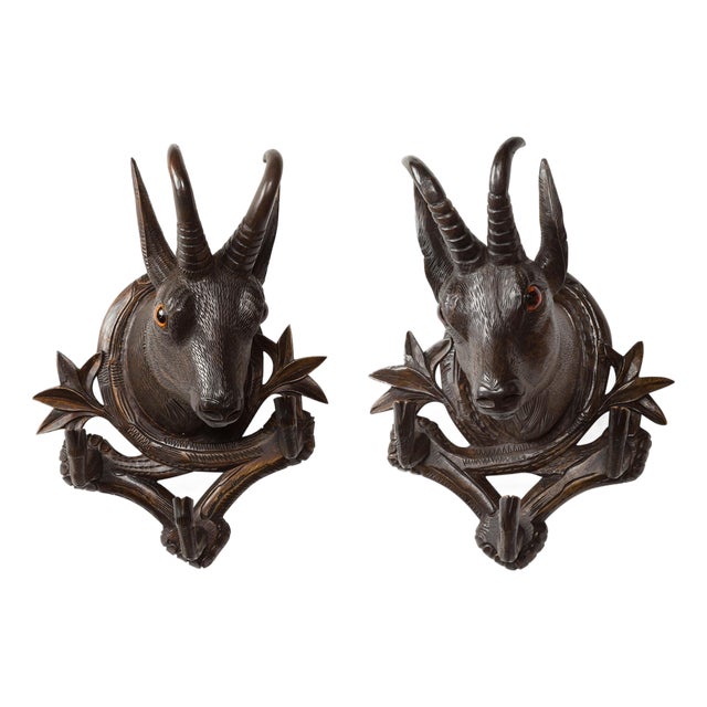 Pair of Black Forest 1880s Carved Wooden Chamois Coat or Hat Racks with Foliage For Sale