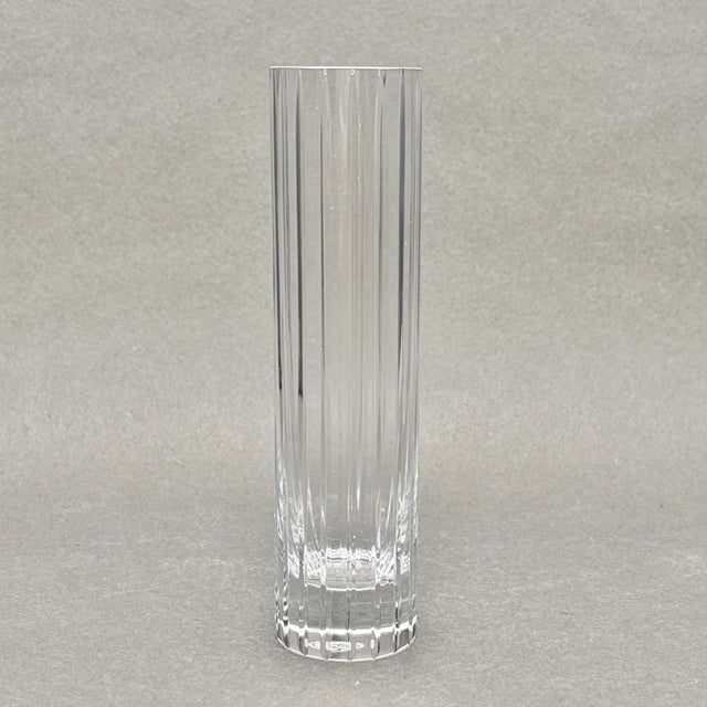 • Baccarat Harmonie fluted crystal bud vase. • Made in France, late 20th century. • Clear crystal with vertical fluted...