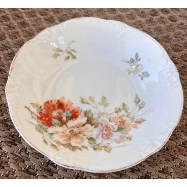 Sweet little trio of antique German porcelain plates, perfect for a small vertical wall space. This would be so pretty in...