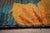 A hand-knotted wool rug, made in India and measuring 8' x 10'. Geometric drawing - repeating motifs held inside strong...