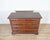 An exceptional early 18th-century chest of drawers from the Emilia region of Italy, crafted in solid walnut and delicately...