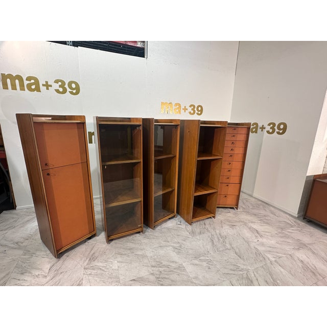 Five Leather and Walnut Artona Chests of Drawers by Afra & Tobia Scarpa for Maxalto These are five exquisite Artona chests...